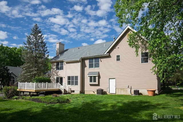 15 Pennyroyal Ct, South Brunswick, NJ 08540 - back of house with a chimney, cooling unit, a lawn, and a deck
