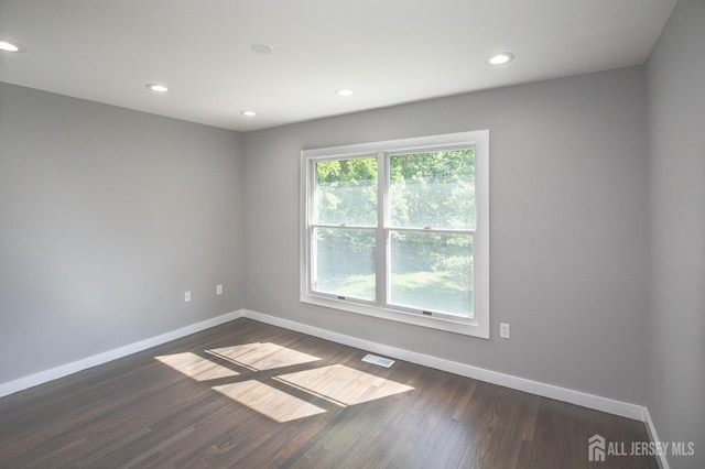 15 Pennyroyal Ct, South Brunswick, NJ 08540 - unfurnished room with baseboards, dark wood-type flooring, and recessed lighting
