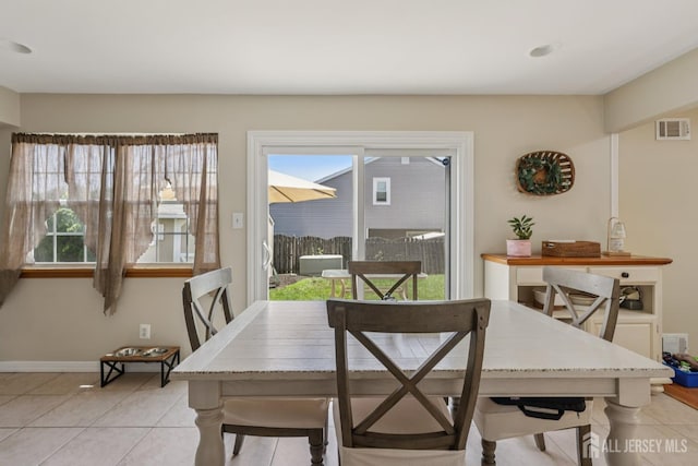 6 E Wintergreen Ave, Edison, NJ 08820 - dining room featuring light tile patterned floors and baseboards