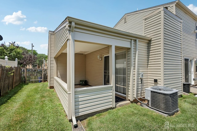 6 E Wintergreen Ave, Edison, NJ 08820 - view of home's exterior with a central AC unit