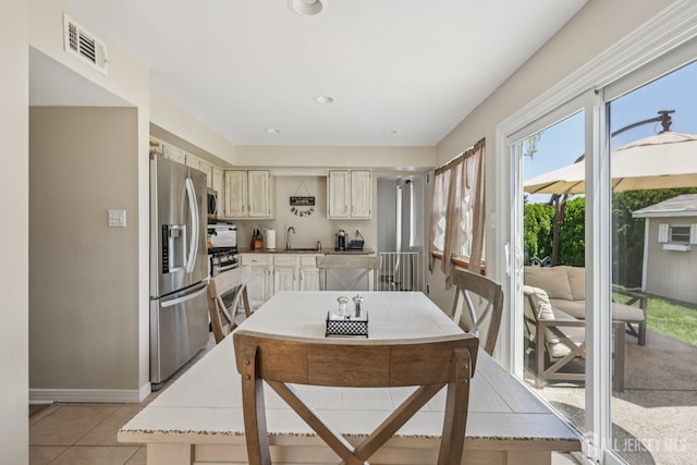 6 E Wintergreen Ave, Edison, NJ 08820 - dining space featuring light tile patterned floors and recessed lighting