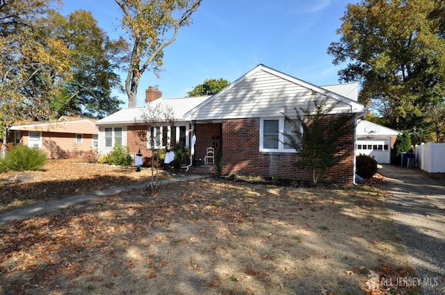 ranch-style house featuring a garage