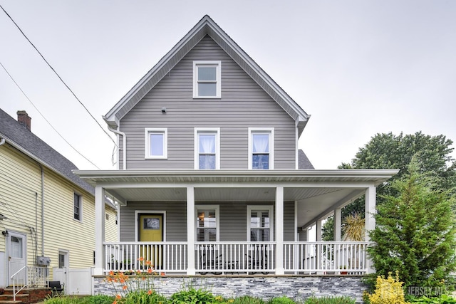 382 Highland St, South Amboy, NJ 08879 - farmhouse-style home featuring a porch
