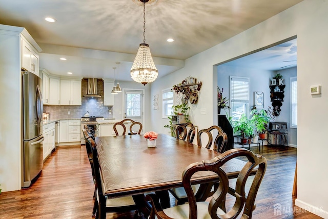 382 Highland St, South Amboy, NJ 08879 - dining room featuring wood finished floors, a chandelier, recessed lighting, and ceiling fan