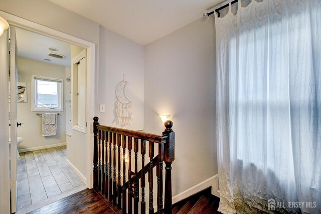 382 Highland St, South Amboy, NJ 08879 - stairway with wood finished floors and baseboards