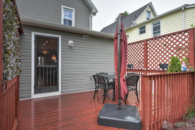 382 Highland St, South Amboy, NJ 08879 - wooden terrace featuring outdoor dining area
