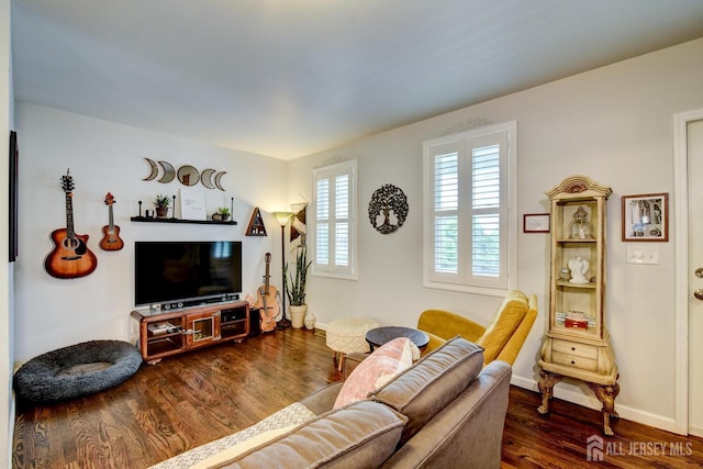 382 Highland St, South Amboy, NJ 08879 - living room with dark wood finished floors and baseboards