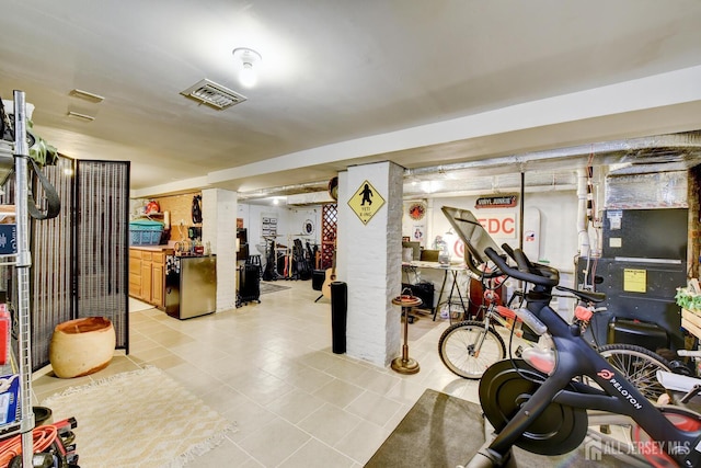382 Highland St, South Amboy, NJ 08879 - exercise room featuring light tile patterned floors