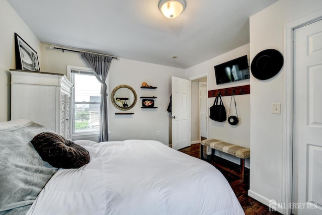 382 Highland St, South Amboy, NJ 08879 - bedroom with dark wood finished floors