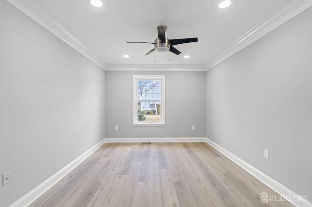 unfurnished room with ceiling fan, light wood-type flooring, and ornamental molding