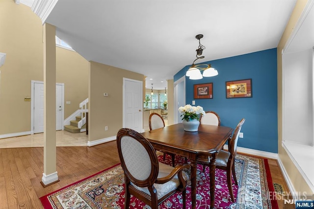 87 Fairway Blvd, Middlesex, NJ 08831 - dining space featuring light wood finished floors, stairway, and baseboards