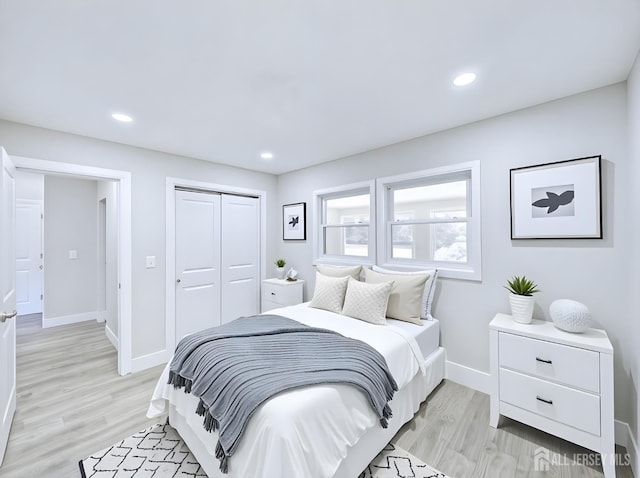 44 Sullivan Way E, Brunswick, NJ 08816 - bedroom with baseboards, light wood finished floors, a closet, and recessed lighting