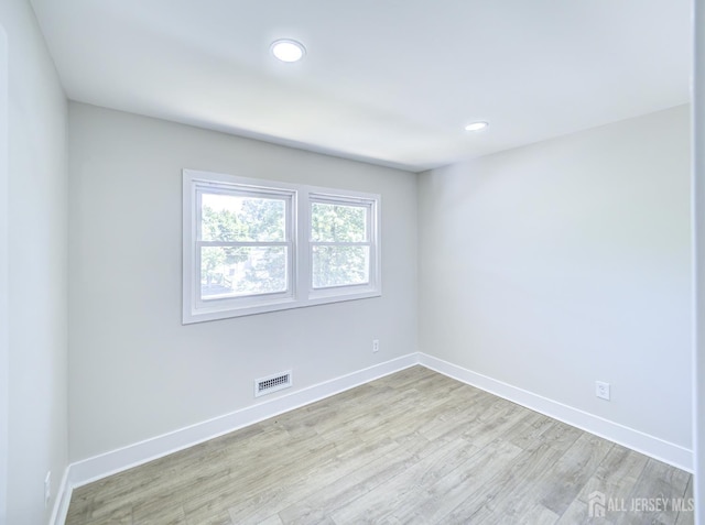 44 Sullivan Way E, Brunswick, NJ 08816 - spare room with baseboards, wood finished floors, and recessed lighting