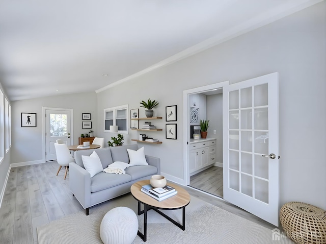 44 Sullivan Way E, Brunswick, NJ 08816 - living room with light wood finished floors, lofted ceiling, and baseboards