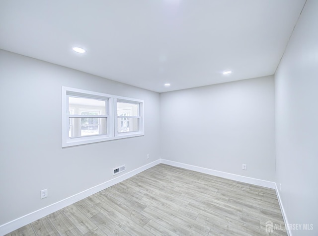 44 Sullivan Way E, Brunswick, NJ 08816 - unfurnished room featuring baseboards, light wood-type flooring, and recessed lighting