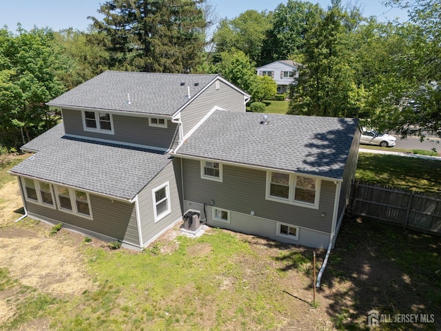 44 Sullivan Way E, Brunswick, NJ 08816 - rear view of property featuring roof with shingles