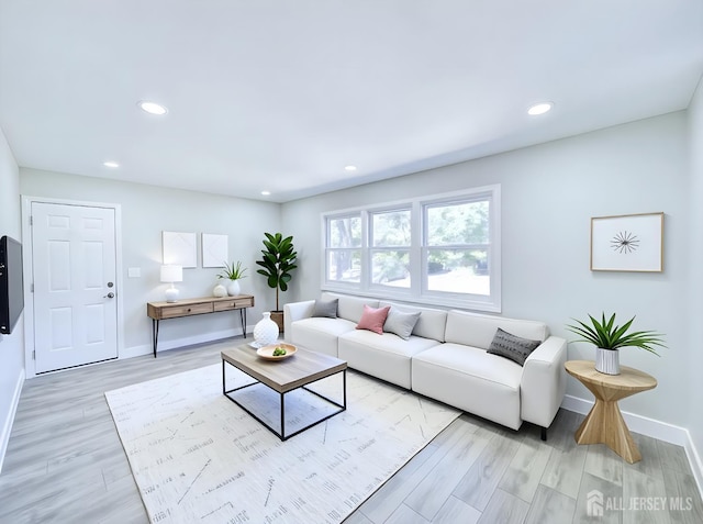 44 Sullivan Way E, Brunswick, NJ 08816 - living room featuring baseboards, light wood finished floors, and recessed lighting