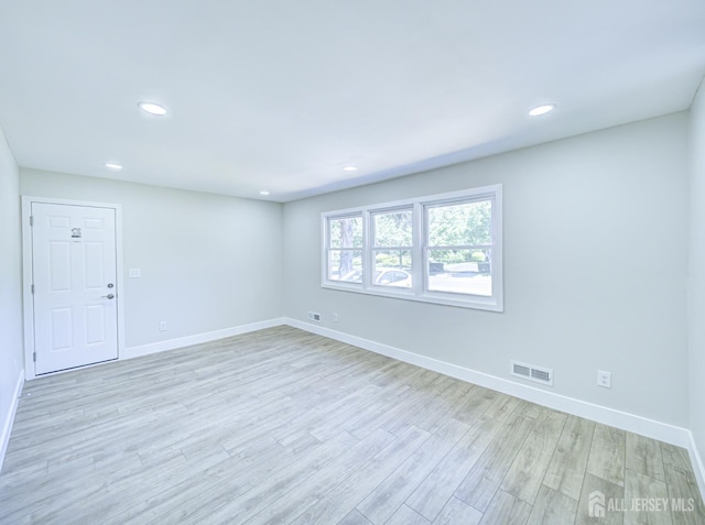44 Sullivan Way E, Brunswick, NJ 08816 - spare room featuring baseboards, light wood finished floors, and recessed lighting