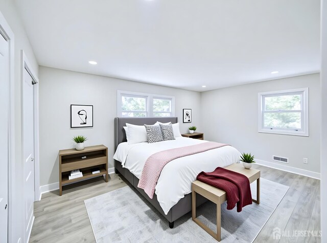 44 Sullivan Way E, Brunswick, NJ 08816 - bedroom with multiple windows, light wood-type flooring, baseboards, and recessed lighting