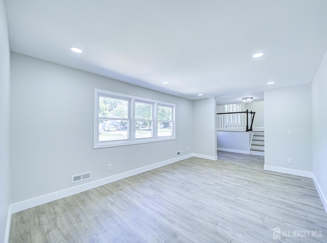 44 Sullivan Way E, Brunswick, NJ 08816 - unfurnished room featuring light wood-style floors, recessed lighting, and stairway