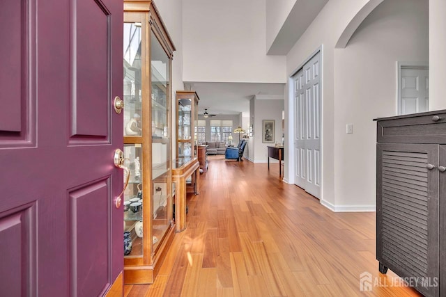 146 Aristotle Way E, Windsor, NJ 08512 - foyer entrance featuring light wood finished floors, arched walkways, and baseboards