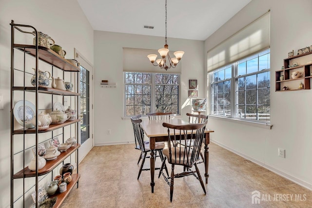 146 Aristotle Way E, Windsor, NJ 08512 - dining area with a chandelier and baseboards