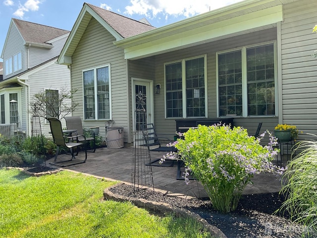 146 Aristotle Way E, Windsor, NJ 08512 - rear view of property with a yard, a patio, roof with shingles, and entry steps