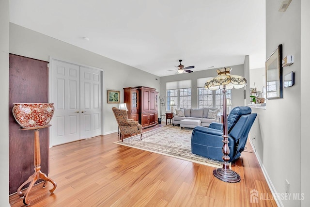 146 Aristotle Way E, Windsor, NJ 08512 - living room with ceiling fan, light wood-style flooring, and baseboards