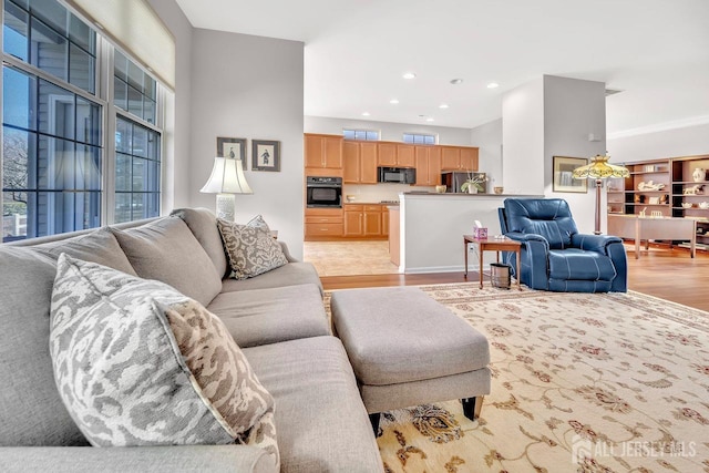 146 Aristotle Way E, Windsor, NJ 08512 - living area with light wood-style flooring and recessed lighting