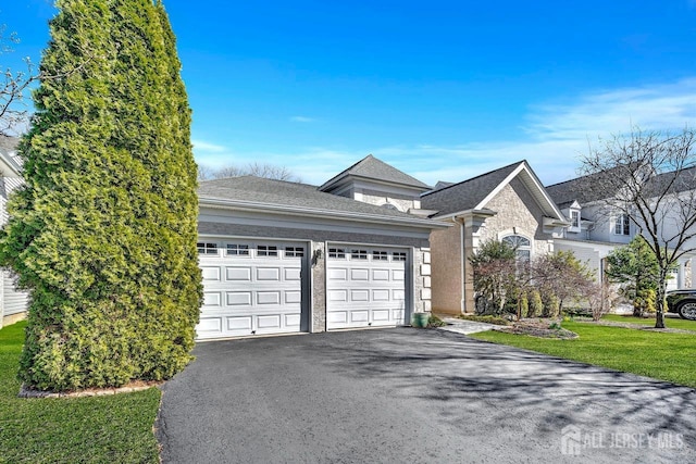 146 Aristotle Way E, Windsor, NJ 08512 - view of front of property with asphalt driveway, a garage, and a front lawn