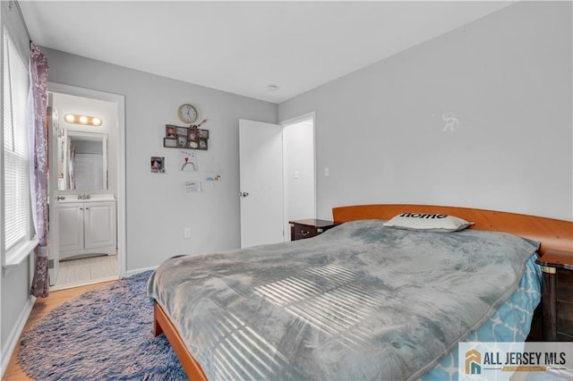 52 Lantern Ln, Sayreville, NJ 08872 - bedroom featuring baseboards and wood finished floors