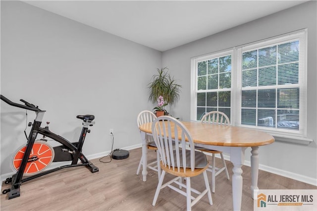 52 Lantern Ln, Sayreville, NJ 08872 - dining area featuring light wood-style floors and baseboards