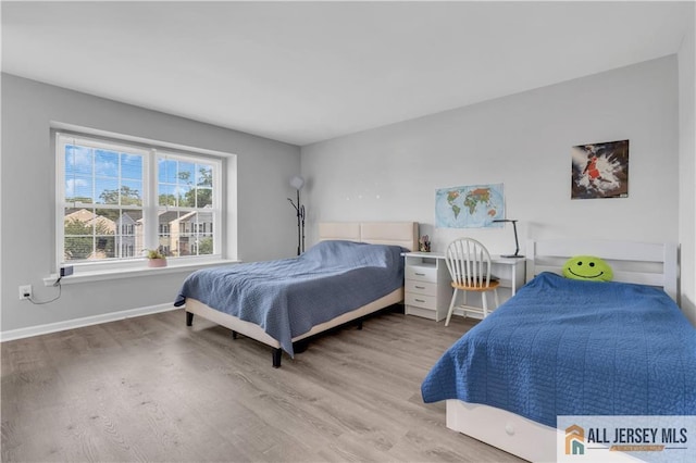 52 Lantern Ln, Sayreville, NJ 08872 - bedroom with wood finished floors and baseboards