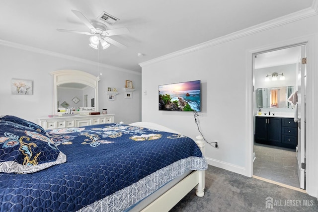 bedroom featuring a sink, visible vents, baseboards, carpet, and crown molding