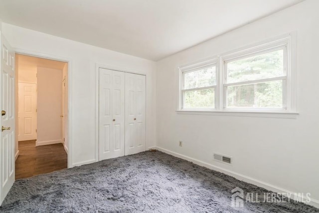42 Corona Rd, East Brunswick, NJ 08816 - unfurnished bedroom with carpet floors and a closet