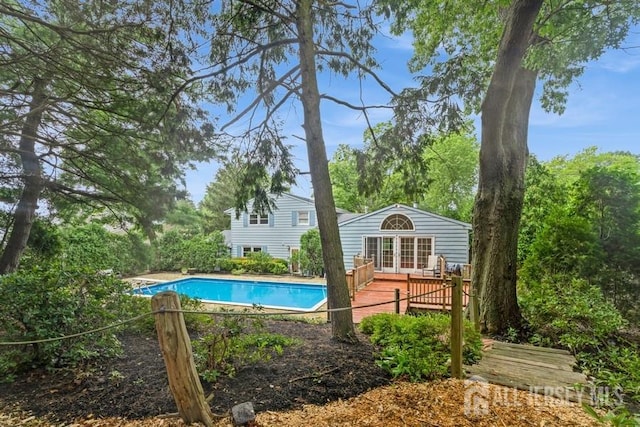 42 Corona Rd, East Brunswick, NJ 08816 - swimming pool featuring a deck and an outbuilding