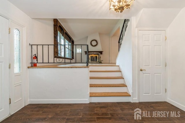 42 Corona Rd, East Brunswick, NJ 08816 - stairs featuring vaulted ceiling and wood finished floors