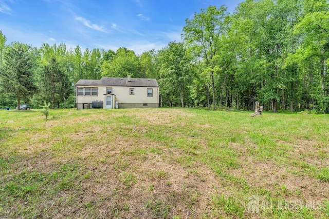 211 E Greystone Rd, Old Bridge, NJ 08857 - view of grassy yard with a wooded view