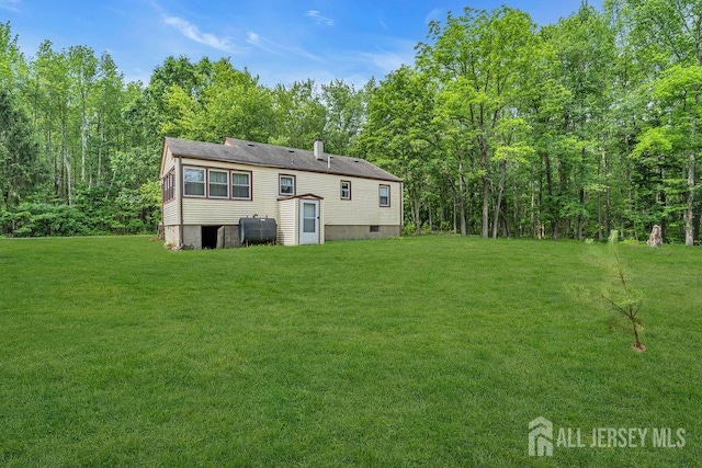 211 E Greystone Rd, Old Bridge, NJ 08857 - back of property featuring a yard and heating fuel