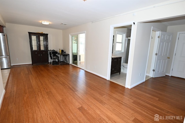 interior space with hardwood / wood-style flooring