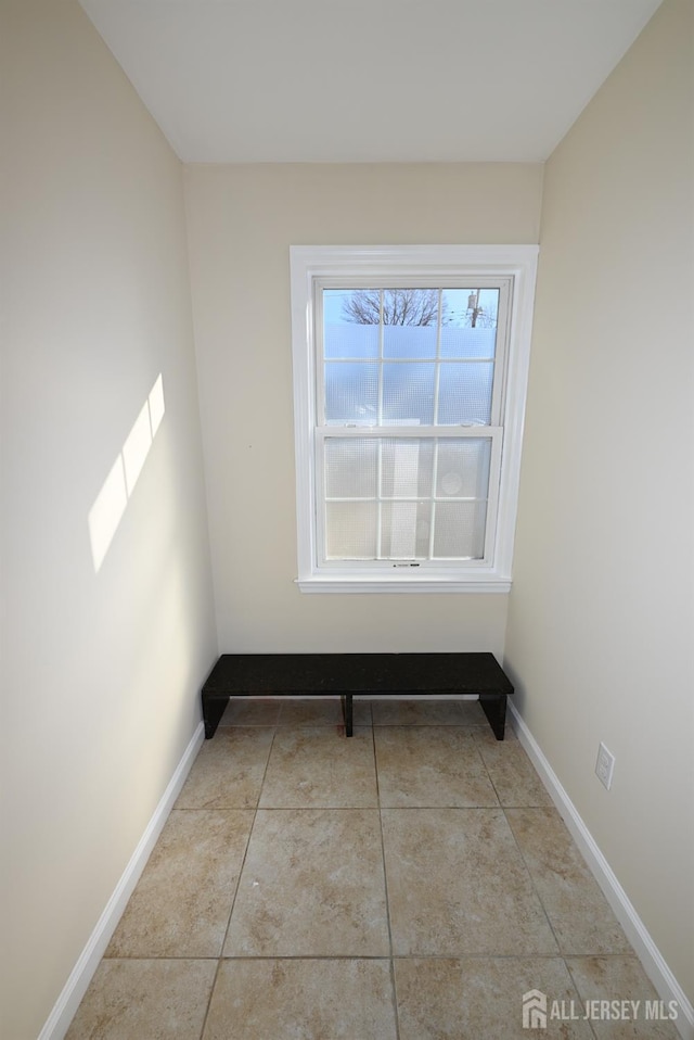 view of tiled spare room