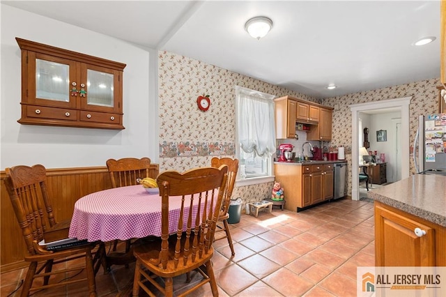 28 Wildwood Ave, Fords, NJ 08863 - dining area with wallpapered walls and light tile patterned floors