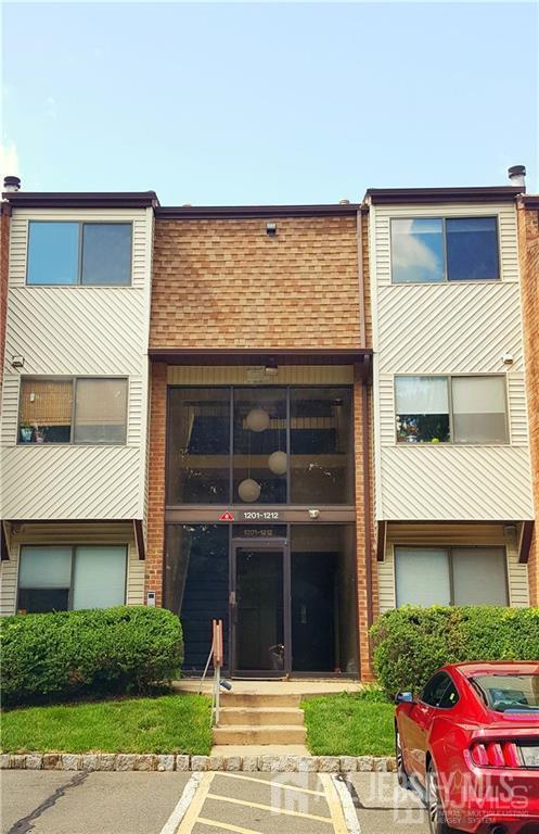 1212 Edison Glen Ter, Edison, NJ 08837 - view of building exterior with uncovered parking