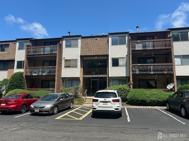 1212 Edison Glen Ter, Edison, NJ 08837 - view of apartment building / complex featuring uncovered parking
