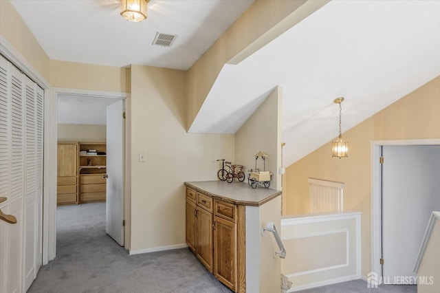 441 Sayre Dr, Plainsboro, NJ 08540 - bar with light carpet, pendant lighting, and baseboards