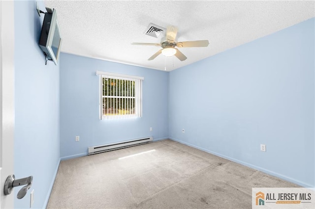 703 Croydon Rd Unit 703B, Monroe, NJ 08831 - carpeted spare room with a baseboard heating unit, a ceiling fan, and a textured ceiling