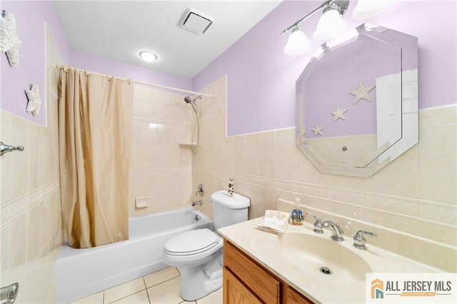 703 Croydon Rd Unit 703B, Monroe, NJ 08831 - full bath with tile walls, shower / tub combo with curtain, vanity, tile patterned flooring, and wainscoting