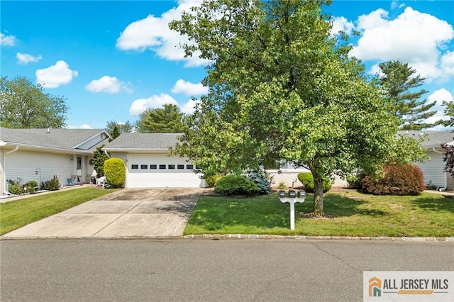 703 Croydon Rd Unit 703B, Monroe, NJ 08831 - view of front of home featuring an attached garage, driveway, and a front yard