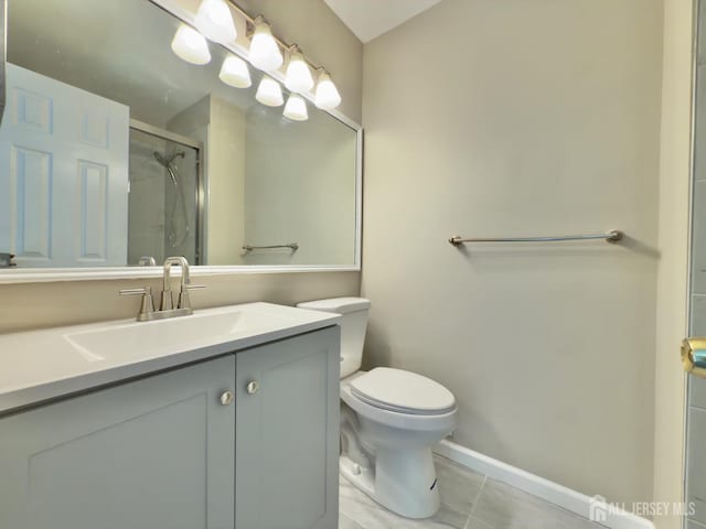 72 Morgan Pl E, Brunswick, NJ 08816 - bathroom featuring a stall shower, vanity, and tile patterned flooring