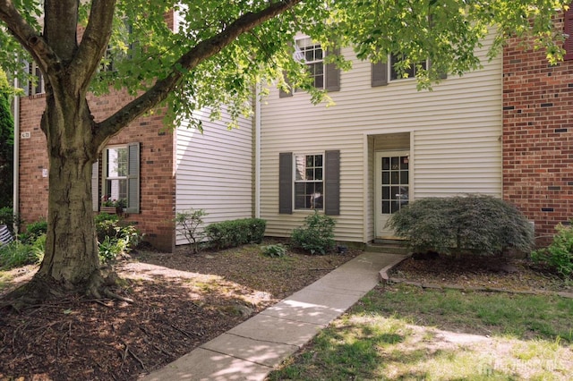 72 Morgan Pl E, Brunswick, NJ 08816 - view of front of home featuring brick siding